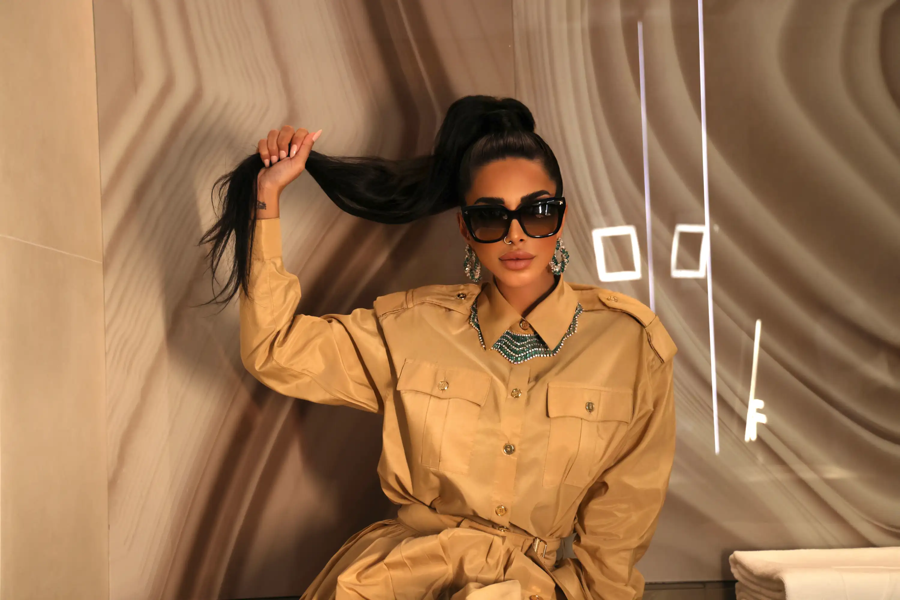 Sara Al Madani in sunglasses